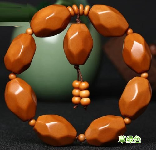 橄榄核机雕与手雕的辨别